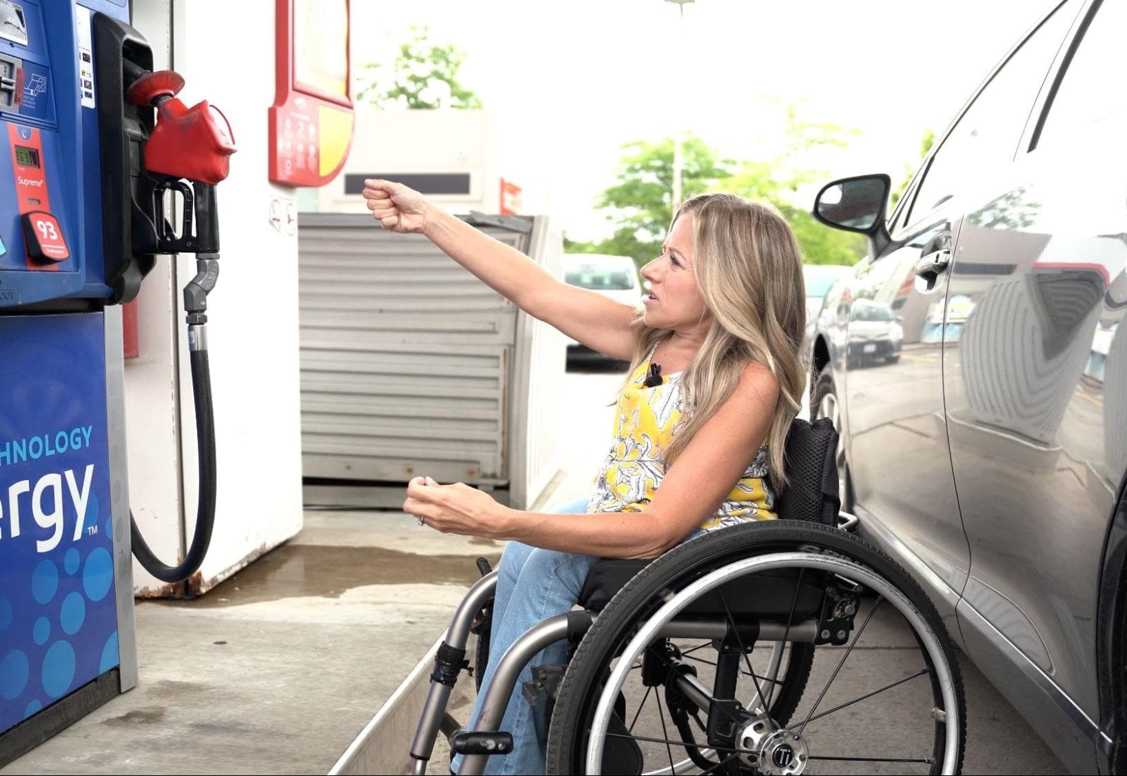 reaching gas nozzle gas pump